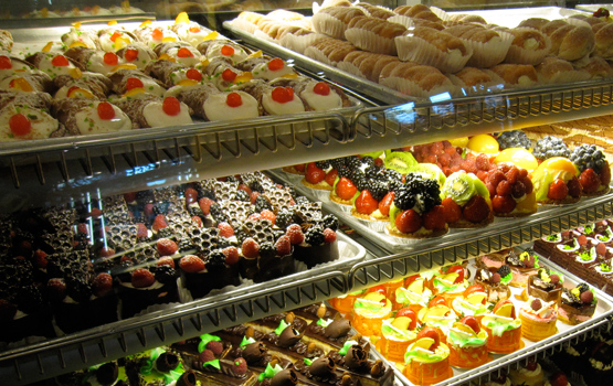 Villabate Alba's pastry displays knock you over when you walk in the store. That's the cannoli, top left.