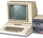 Apple II computer, 2 disc drives.