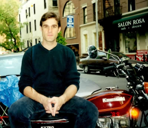 The author sitting atophis ex-motorcycle, a '79 Kowasaki KZ-750, Blue Book value $70.